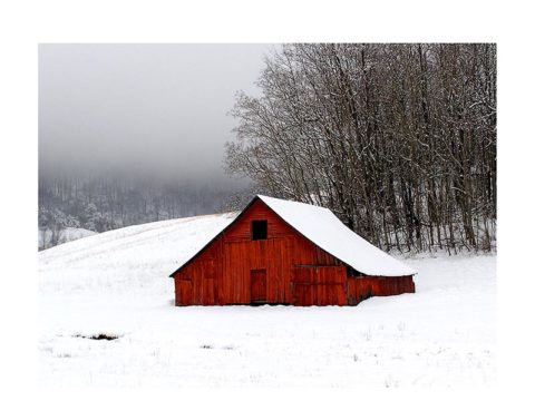 red barn in the snow by John Bice