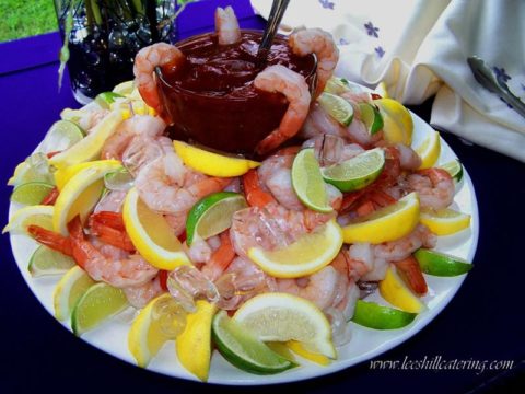 Shrimp cocktail with lemon and lime wedges from Lee's Hill Catering