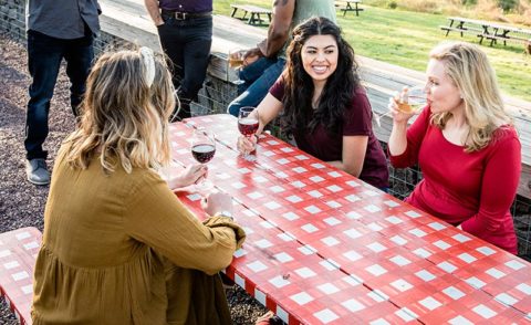 Women drinking wine at Wilderness Run Winery