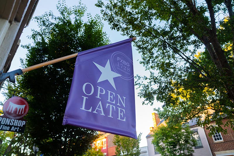 First Friday open late flag