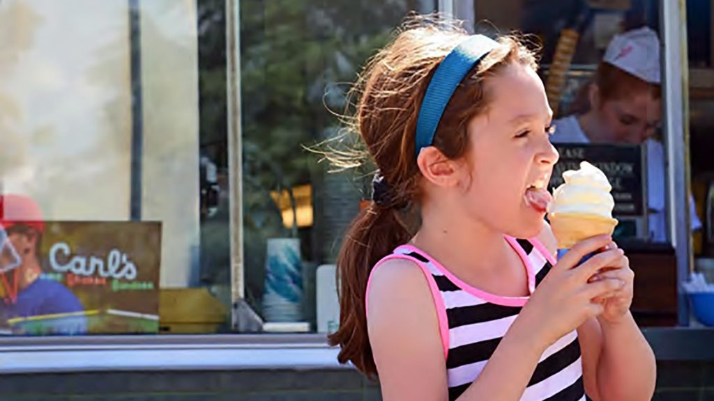 girl eating ice cream at Carl's