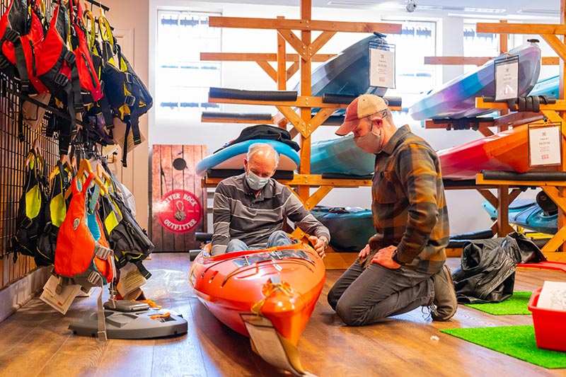kayaks at local outdoor sporting goods shop