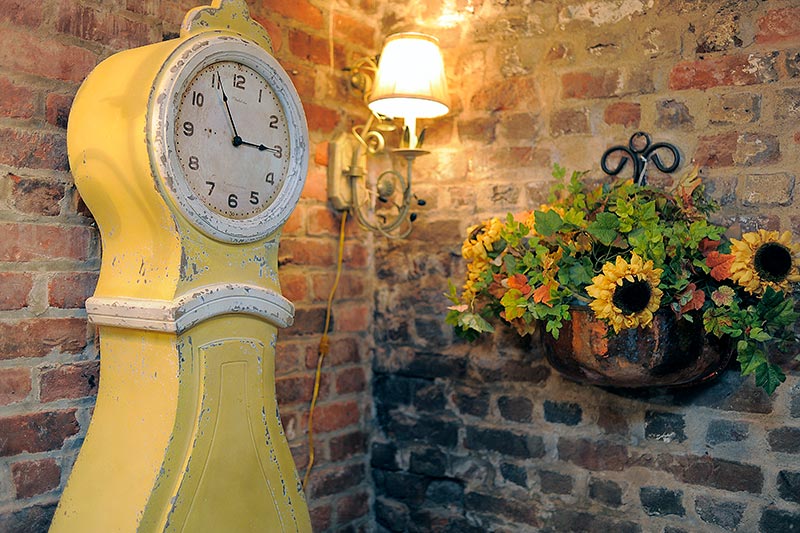 antique yellow clock at local decor shop