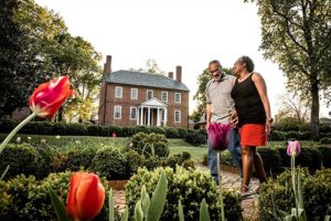 couple walking through gardens at Historic Kenmore