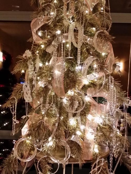white lights sparking on a Christmas Tree