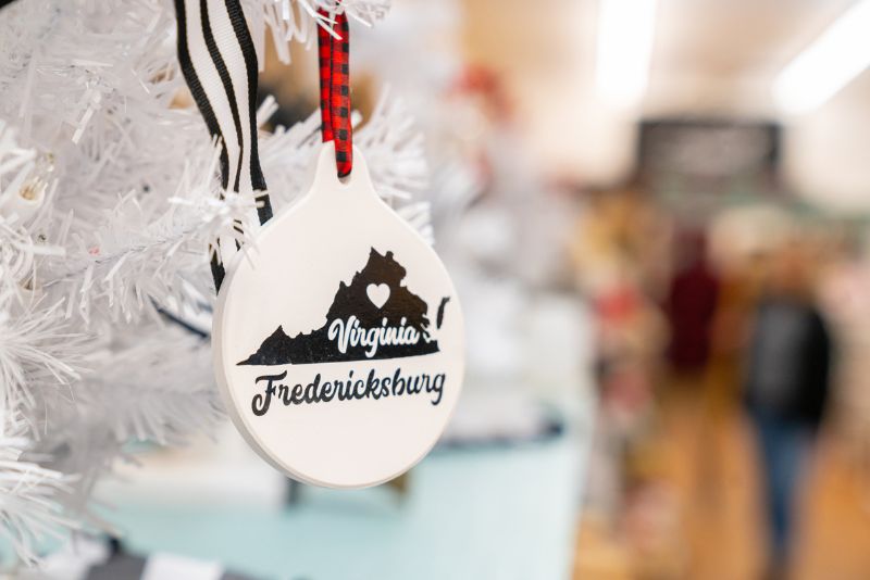 black and white fredericksburg virginia ornament hanging on a tree