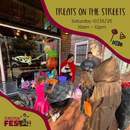 Kids trick or treating outside of a business.