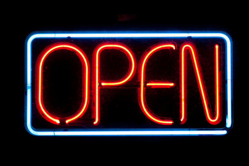 Open neon sign - blue square around the word open in red