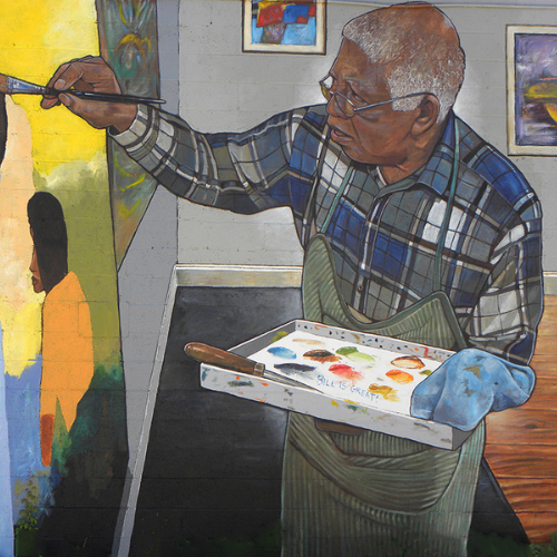 Mural of Johnny Johnson. Painting of Johnny Johnson painting a piece of art.