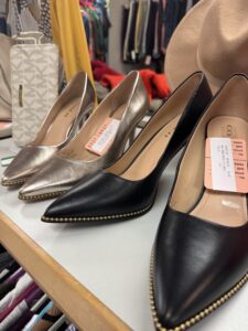 Two pairs of Coach heels up for resale at the Re-run shop.