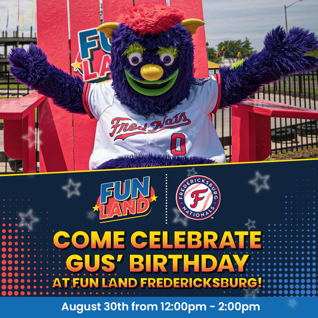 Photo of Gus the mascot on the big red FunLand chair.