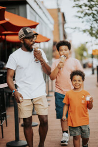 
Family eating ice cream downtown.