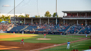 Baseball game n a large stadium.