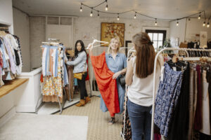Group of women shopping in a boutique.