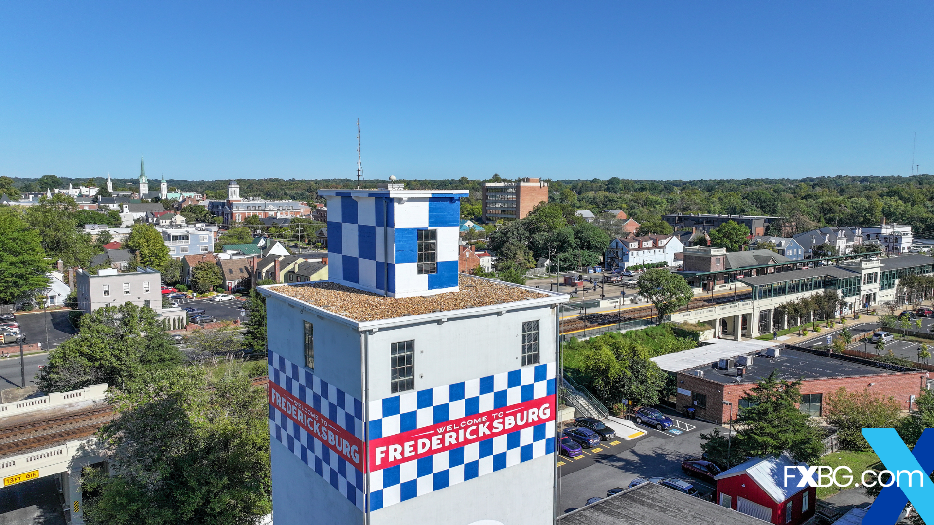 an aerial view of a water tower in downtown Fredericksburg.