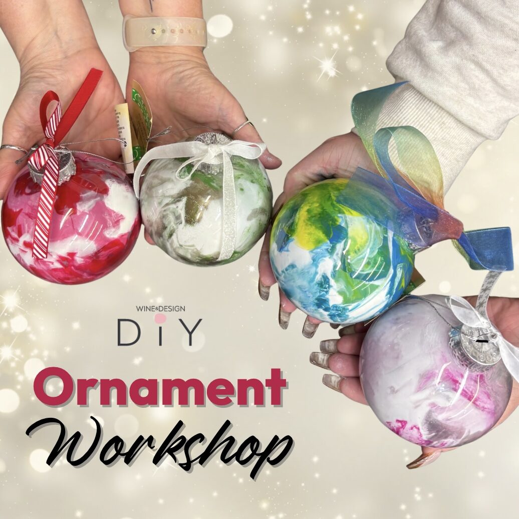 Four hands holding Christmas ornaments.