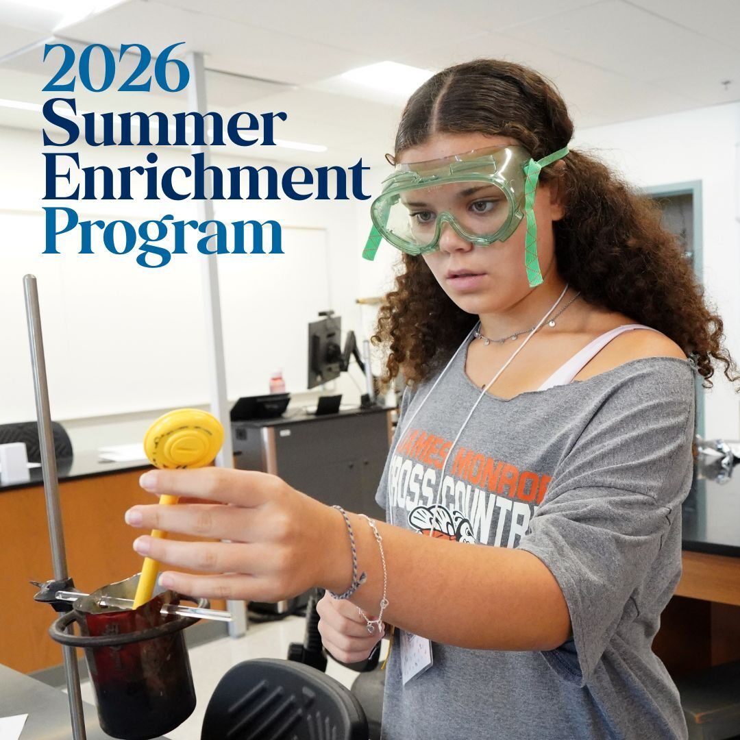 Girl wearing lab goggles doing a science experiment.