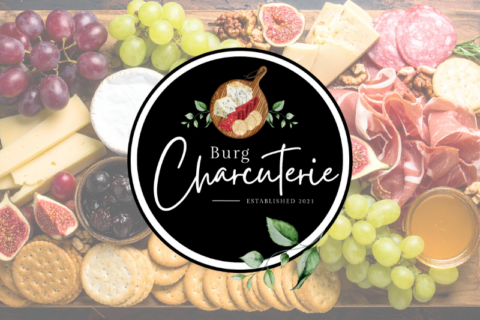 Burg charcuterie logo over an image of a charcuterie board.