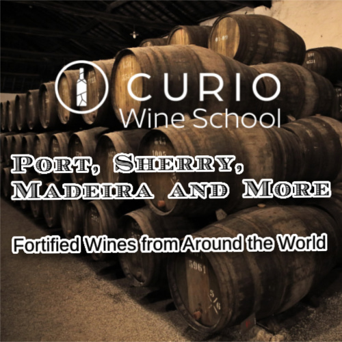 Cuirio wine school logo over a photo of barrels in a wine cellar.