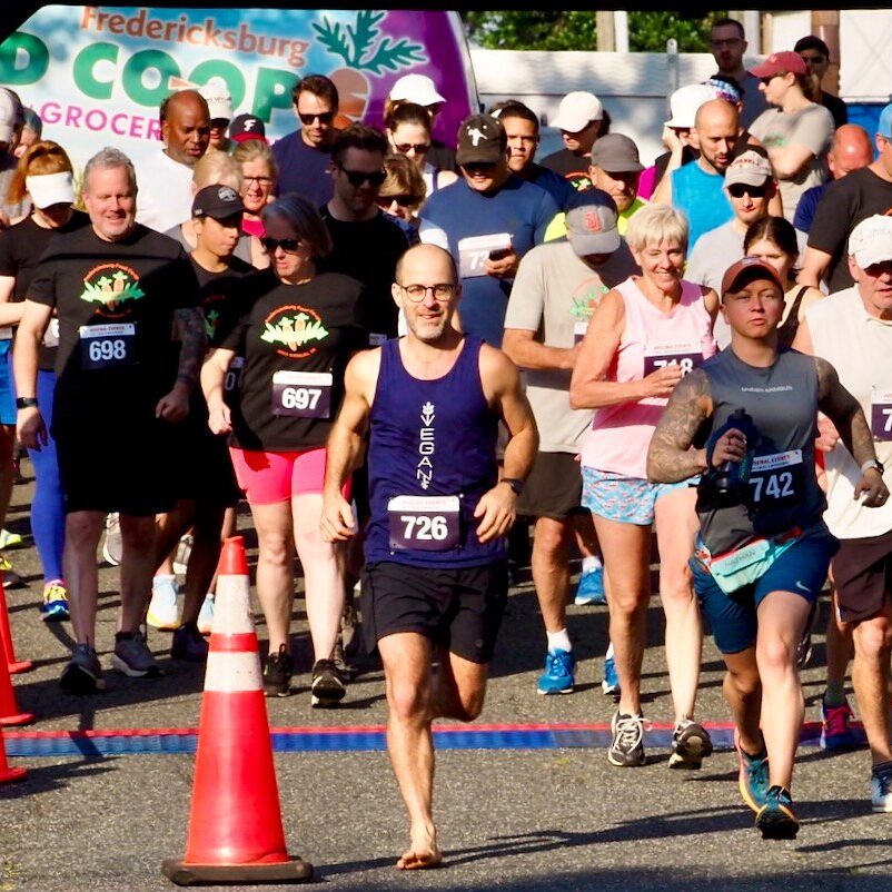 Runners running in the co-op 5k