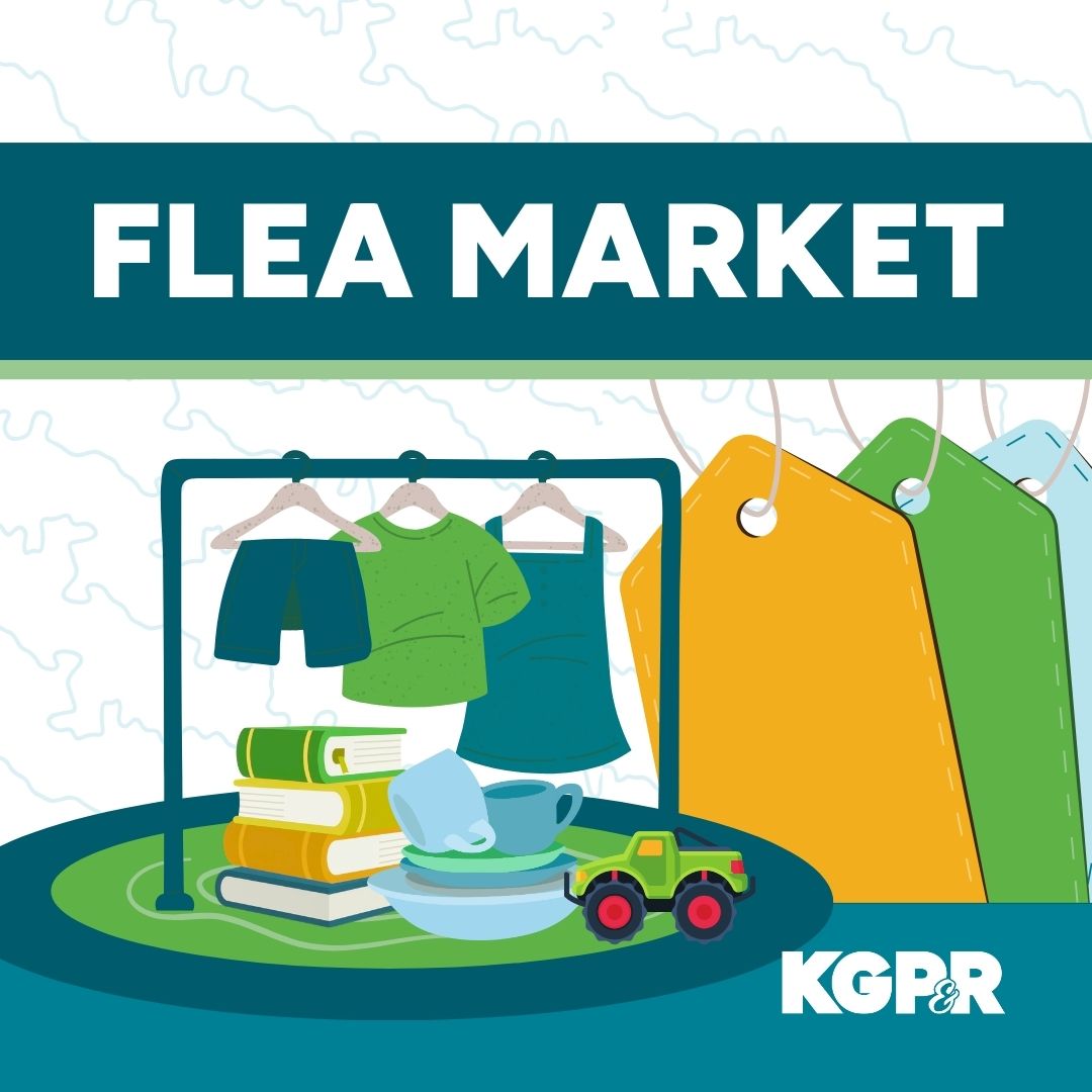 A graphic advertising a flea market with the text "FLEA MARKET" at the top. Below are clothes on hangers, stacks of books, dishes, and a toy truck, with large colorful tags in the background. The KGPR logo is in the bottom right corner.