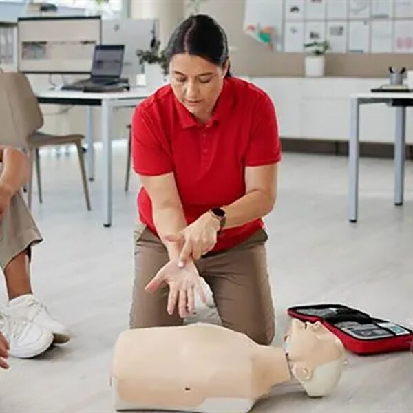 Woman demonstrating CPR