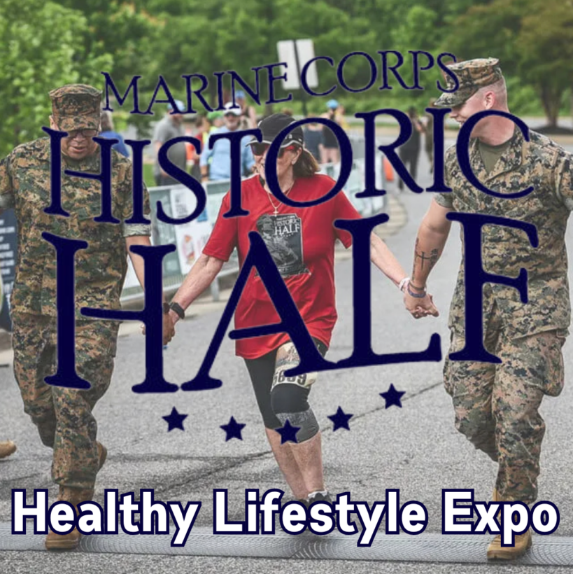 Two marines and a race participant crossing the historic half finish line. Historic Half logo overlaid.