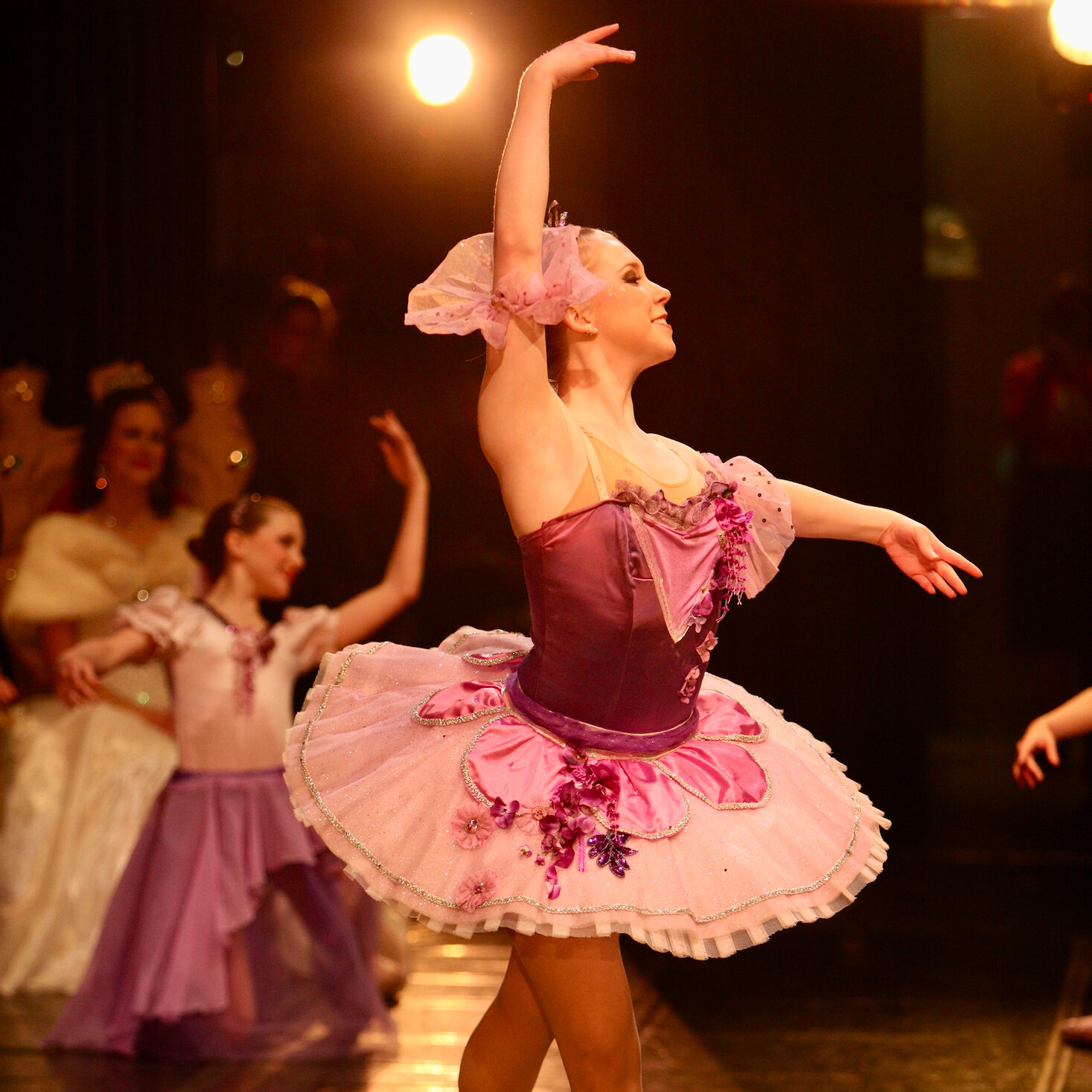 A ballerina performing on stage.